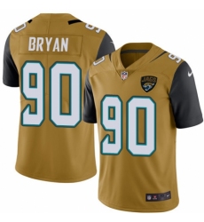 Men's Nike Jacksonville Jaguars #90 Taven Bryan Limited Gold Rush Vapor Untouchable NFL Jersey